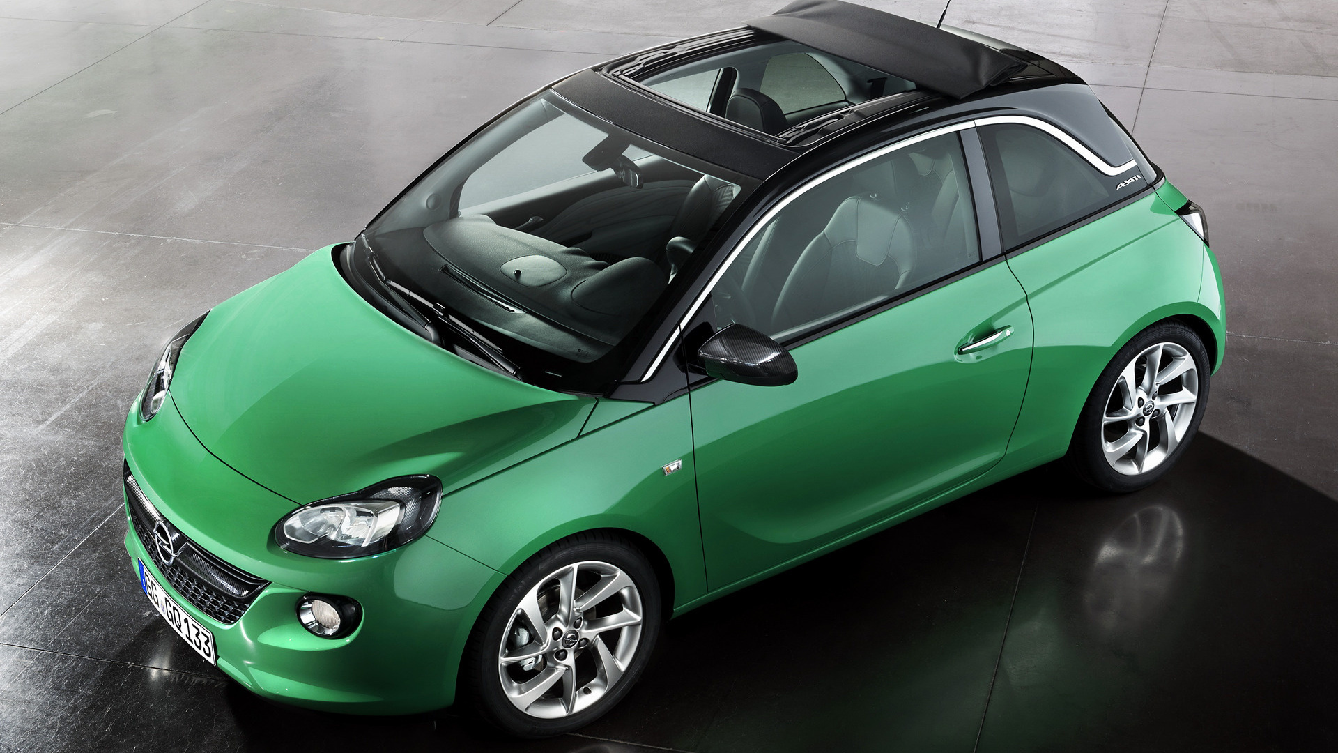 Автомобили хэтчбек с пробегом. Opel Adam. Opel Adam Green. Опель малолитражка. Опель хэтчбек мини.