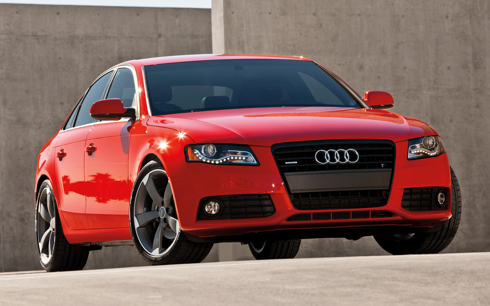 Audi a4 b8 фары. Audi a4. Audi a4 2008 красная. Машина Ауди а4 новая. Audi a4 b8 Red.