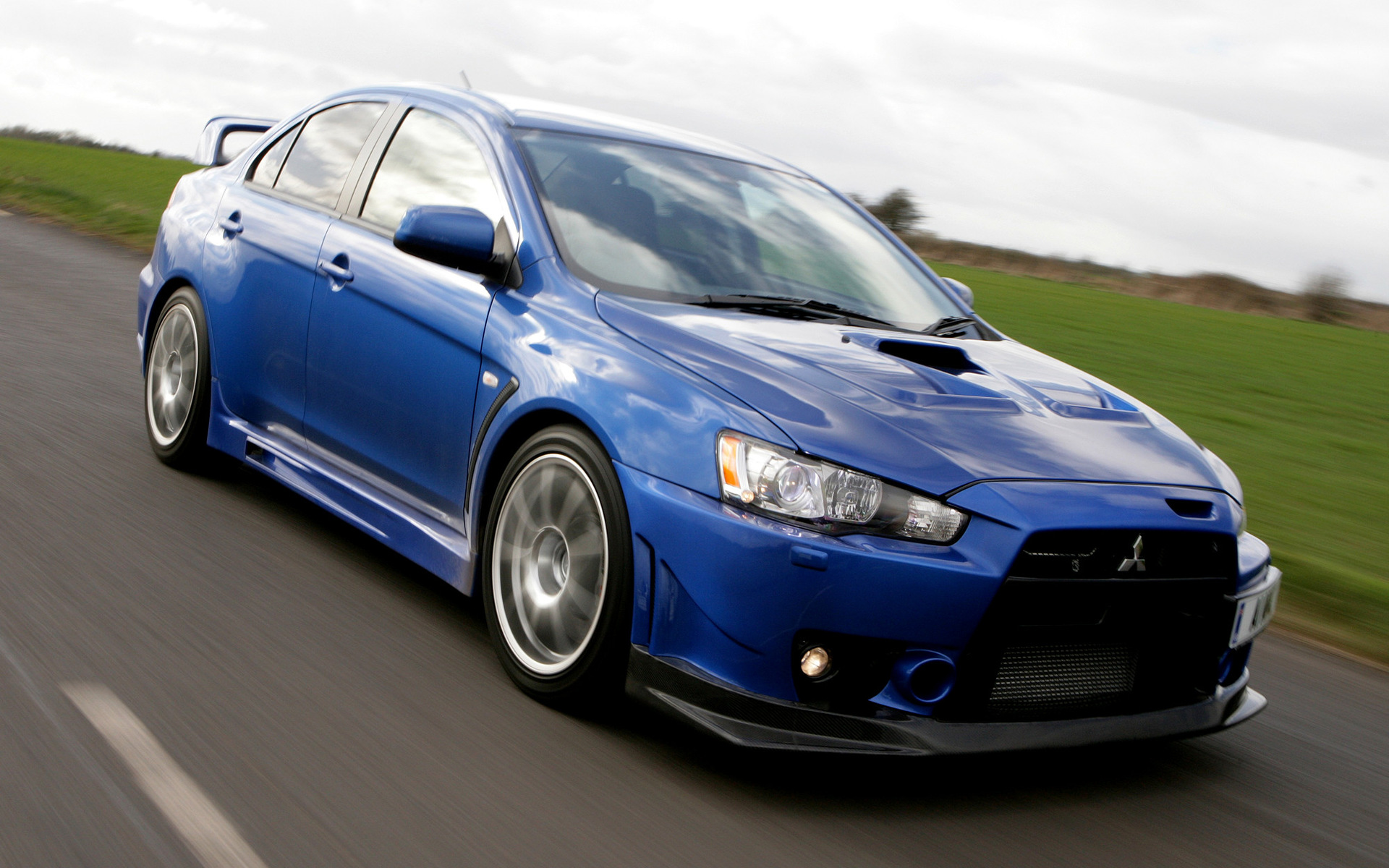 2009 Mitsubishi Lancer Evolution X FQ-400 - Wallpapers and HD Images.